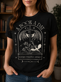 A book a day keeps reality away T-Shirt, Funny book quotes T-shirt